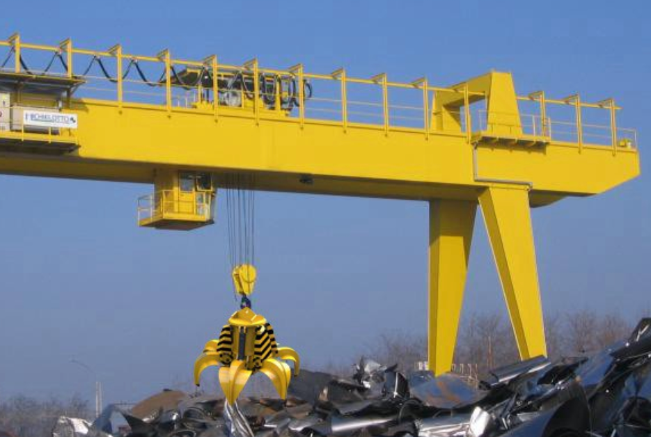 Кран козловой грейферный